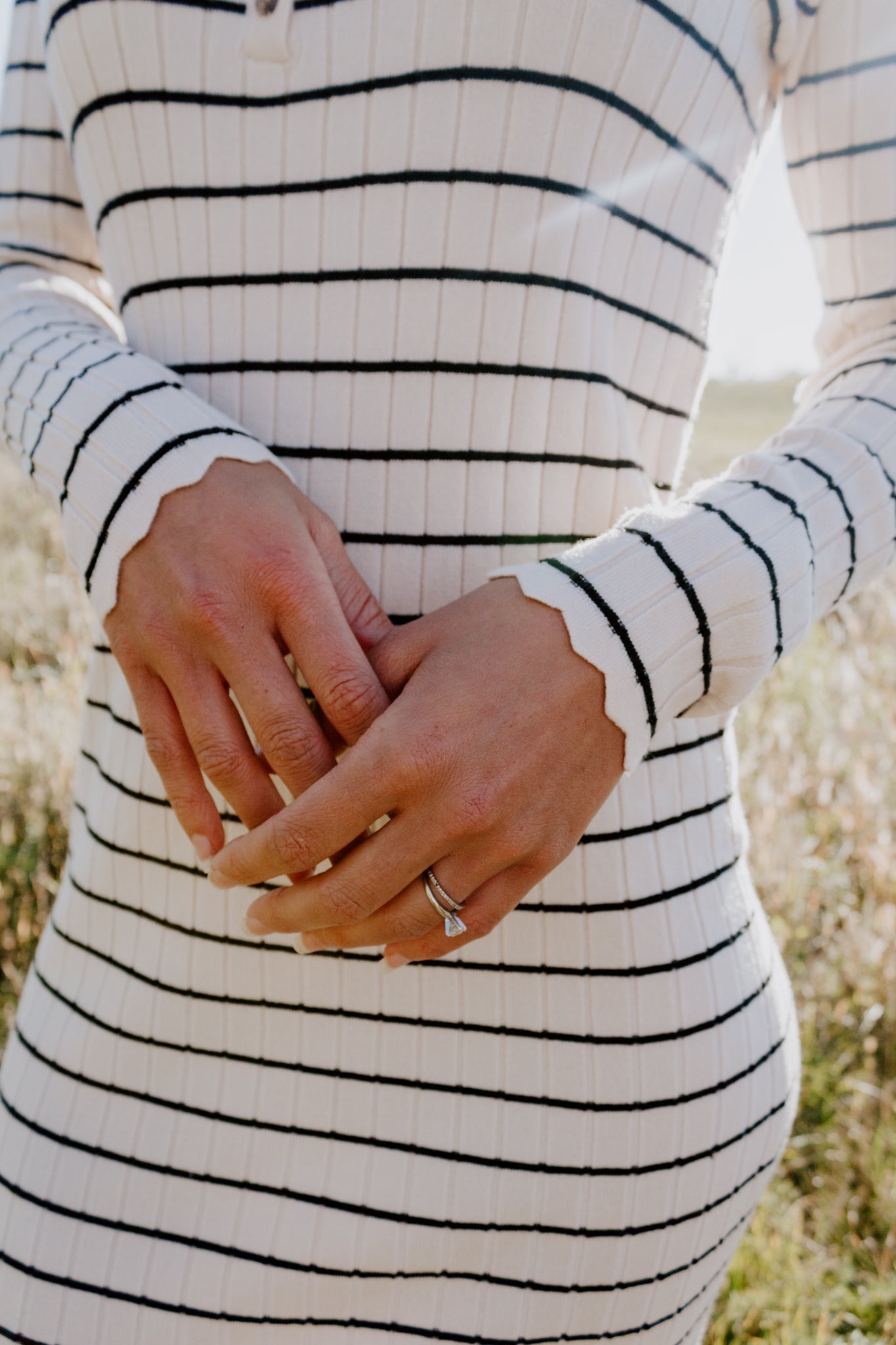 Beautiful Striped Sweater Dress in Oatmeal and black with buttons and ribbed design and sleeve detailing