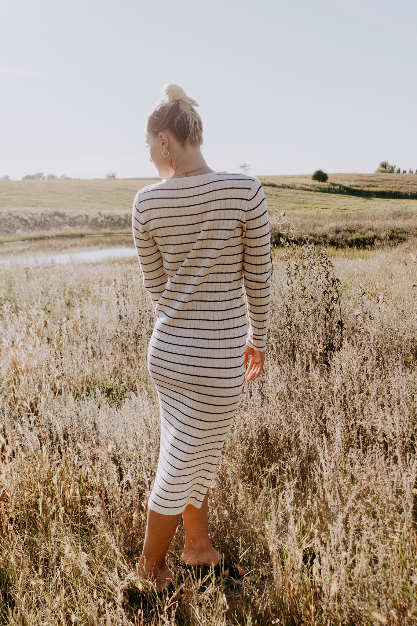 Beautiful Striped Sweater Dress in Oatmeal and black with buttons and ribbed design and sleeve detailing