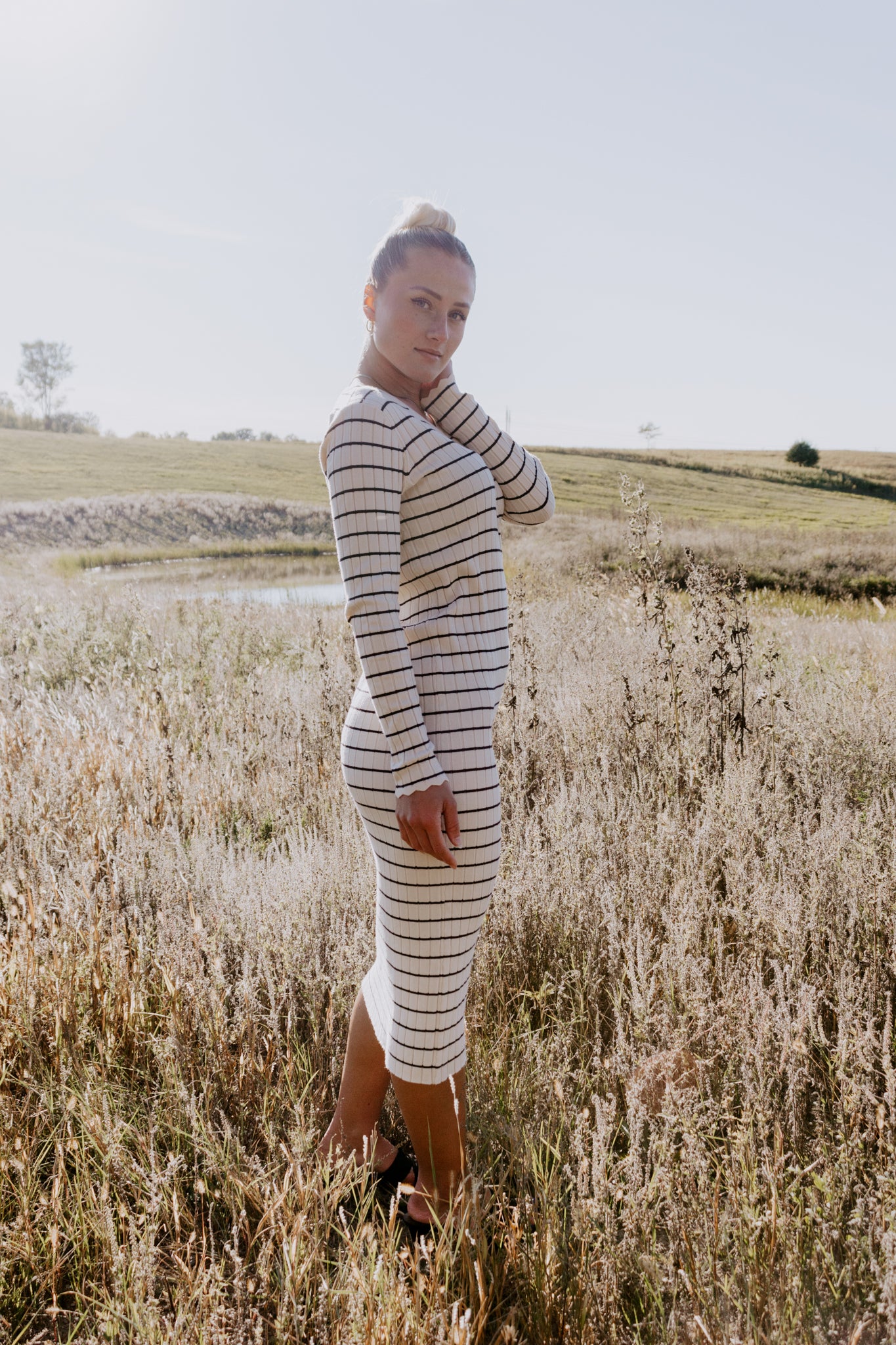 Beautiful Striped Sweater Dress in Oatmeal and black with buttons and ribbed design and sleeve detailing