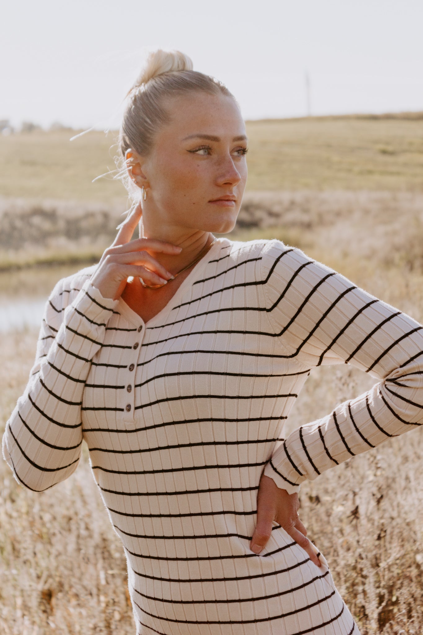 Beautiful Striped Sweater Dress in Oatmeal and black with buttons and ribbed design and sleeve detailing