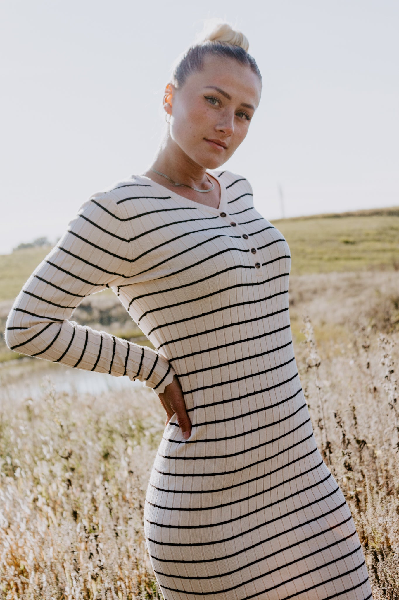 Beautiful Striped Sweater Dress in Oatmeal and black with buttons and ribbed design and sleeve detailing