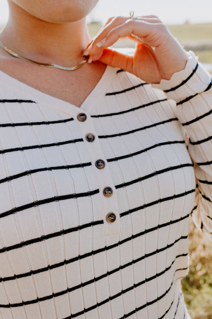 Beautiful Striped Sweater Dress in Oatmeal and black with buttons and ribbed design and sleeve detailing