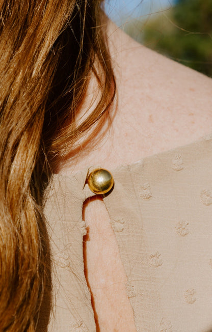 Beautiful midi swiss dot dress in vintage stone short sleeve with gold back closure button