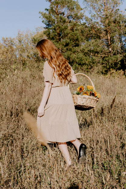 Beautiful midi swiss dot dress in vintage stone short sleeve with gold back closure button